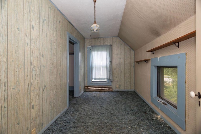 5046 State Highway 33, West Bend, WI 53095 - hall featuring lofted ceiling, carpet flooring, and wood walls