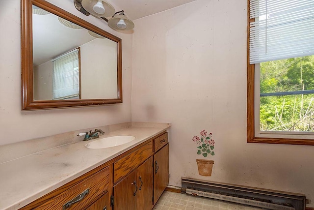 5046 State Highway 33, West Bend, WI 53095 - bathroom with a baseboard heating unit and vanity