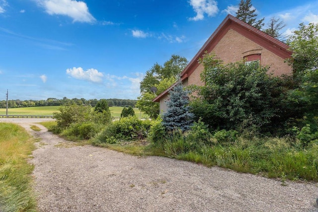 5046 State Highway 33, West Bend, WI 53095 - view of side of property with brick siding