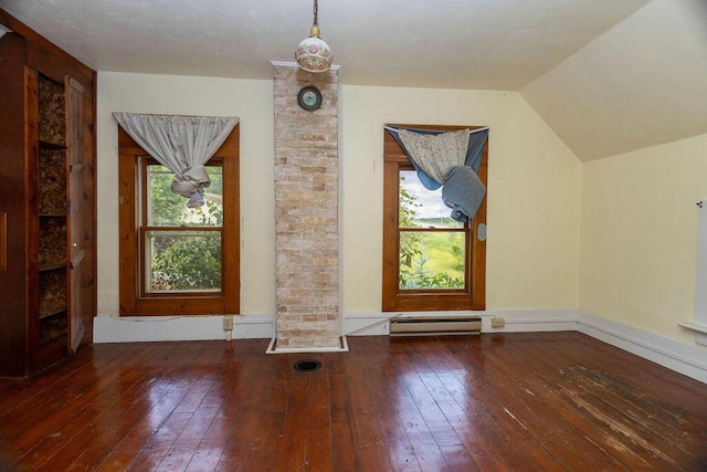 5046 State Highway 33, West Bend, WI 53095 - bonus room featuring hardwood / wood-style floors, baseboard heating, vaulted ceiling, and decorative columns