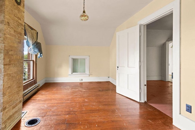 5046 State Highway 33, West Bend, WI 53095 - bonus room with baseboard heating, hardwood / wood-style flooring, and vaulted ceiling