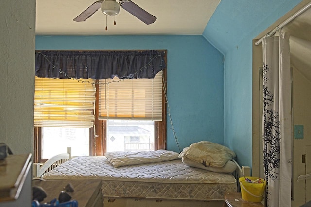 134 N Watertown St, Waupun, WI 53963 - bedroom with vaulted ceiling and ceiling fan
