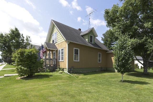 134 N Watertown St, Waupun, WI 53963 - view of home's exterior featuring a lawn