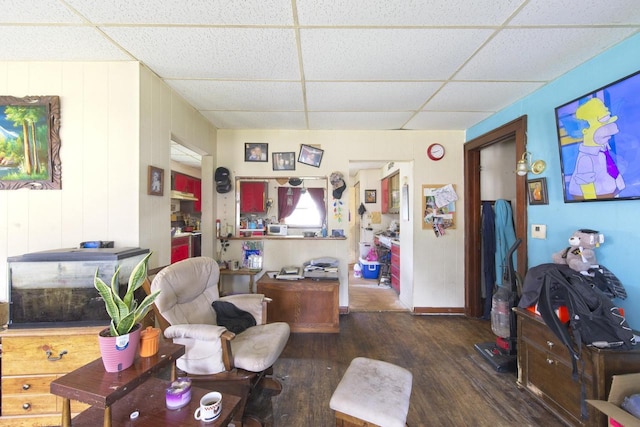 134 N Watertown St, Waupun, WI 53963 - living area featuring a paneled ceiling and wood finished floors
