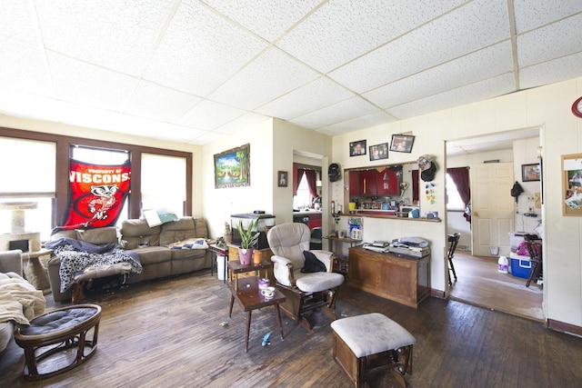 134 N Watertown St, Waupun, WI 53963 - living room with a paneled ceiling and wood finished floors