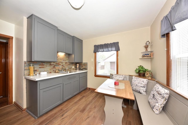 2044 S 96th St, West Allis, WI 53227 - kitchen with gray cabinets, light countertops, and backsplash
