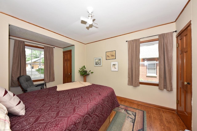 2044 S 96th St, West Allis, WI 53227 - bedroom featuring wood finished floors and crown molding
