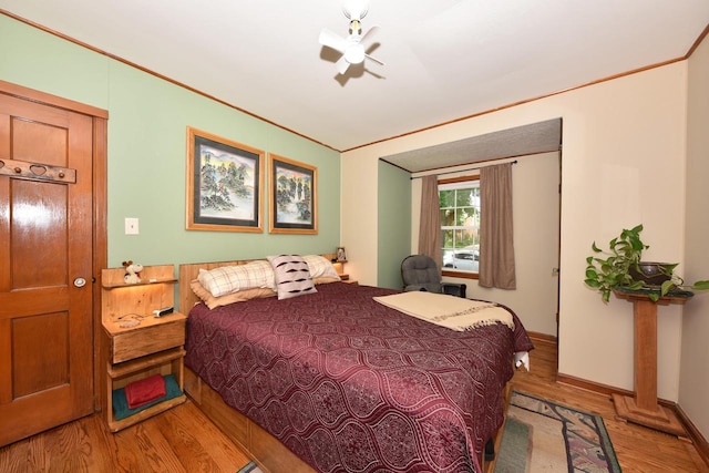 2044 S 96th St, West Allis, WI 53227 - bedroom featuring wood finished floors and ornamental molding