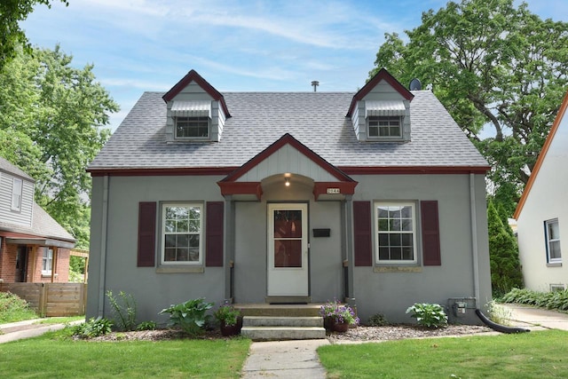 2044 S 96th St, West Allis, WI 53227 - view of front of property with a shingled roof and stucco siding