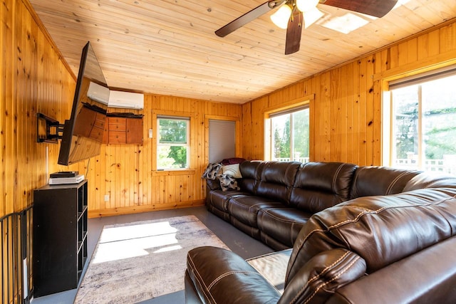 E2880 Witcraft Ridge Rd, Genoa, WI 54632 - living room featuring plenty of natural light, wood ceiling, wooden walls, an AC wall unit, and a ceiling fan