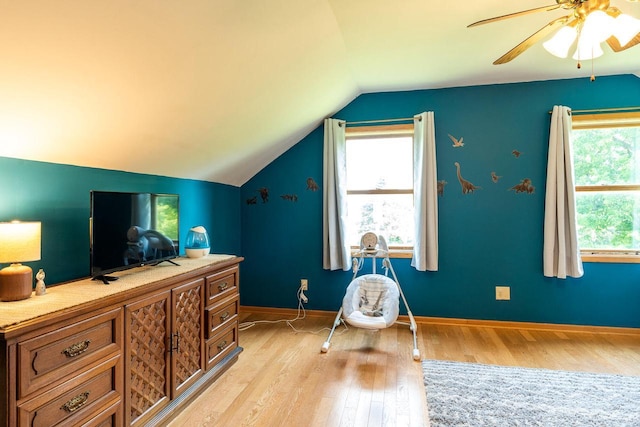 E2880 Witcraft Ridge Rd, Genoa, WI 54632 - bedroom with light wood finished floors, vaulted ceiling, and a ceiling fan