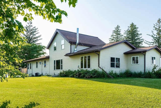 E2880 Witcraft Ridge Rd, Genoa, WI 54632 - rear view of house with a yard