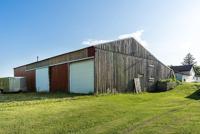 E2880 Witcraft Ridge Rd, Genoa, WI 54632 - view of pole building with a yard