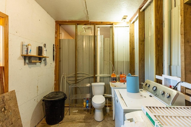 E2880 Witcraft Ridge Rd, Genoa, WI 54632 - bathroom with washer and dryer, vanity, concrete floors, and a shower
