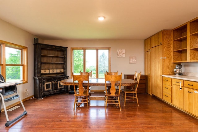 E2880 Witcraft Ridge Rd, Genoa, WI 54632 - dining room with healthy amount of natural light and dark wood finished floors