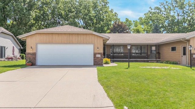 2232 N Cloudview Dr, Appleton, WI 54914 - view of front facade featuring brick siding, a front lawn, concrete driveway, a shingled roof, and an attached garage