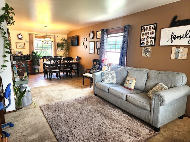 5100 16th St, Racine, WI 53406 - carpeted living area with a chandelier and healthy amount of natural light