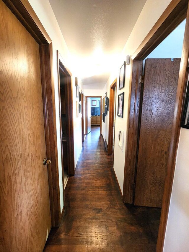 5100 16th St, Racine, WI 53406 - hallway with dark wood finished floors and baseboards