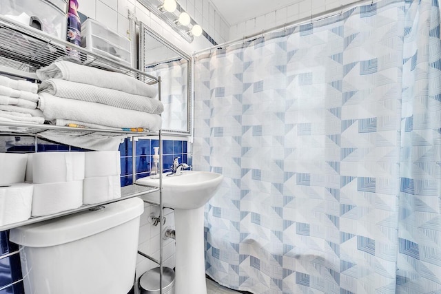 2813 21st St, Racine, WI 53403 - bathroom with tile walls and a shower with shower curtain