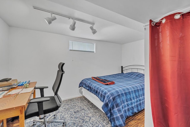 2813 21st St, Racine, WI 53403 - bedroom featuring rail lighting and baseboards