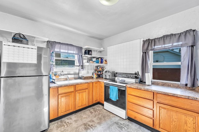 2813 21st St, Racine, WI 53403 - kitchen featuring freestanding refrigerator, white range with electric stovetop, open shelves, and brown cabinets