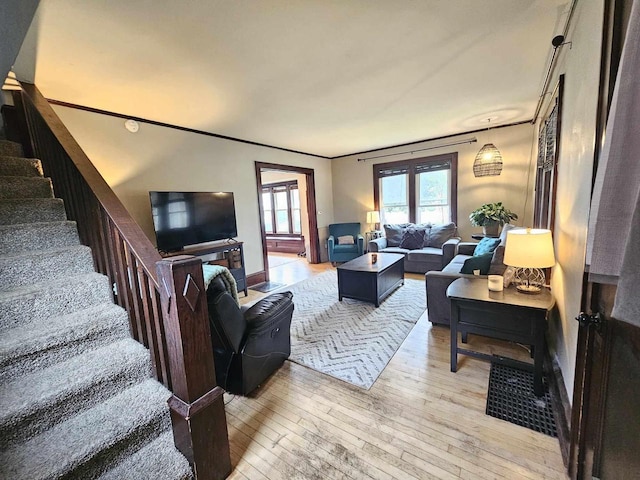556 E Jefferson St, Waupun, WI 53963 - living area featuring light wood finished floors and stairs