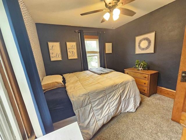 556 E Jefferson St, Waupun, WI 53963 - carpeted bedroom with ceiling fan and baseboards