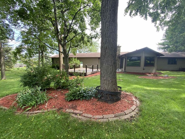 5572 Stable View Ln, Fitchburg, WI 53575 - view of green lawn with a deck