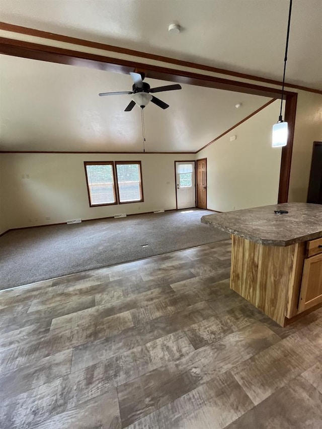 N13403 US Highway 141, Wausaukee, WI 54177 - unfurnished living room with a ceiling fan and dark carpet