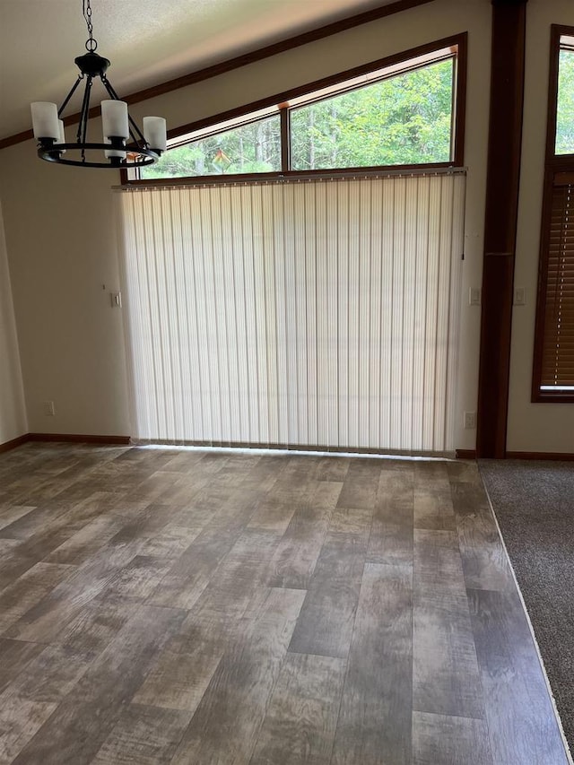 N13403 US Highway 141, Wausaukee, WI 54177 - unfurnished dining area with a chandelier and baseboards