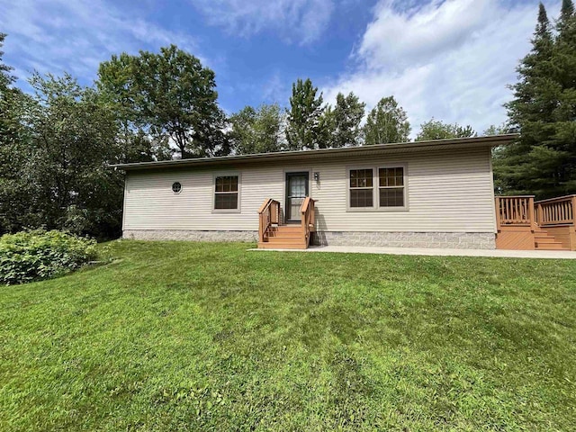N13403 US Highway 141, Wausaukee, WI 54177 - view of front of home with a front lawn and a deck
