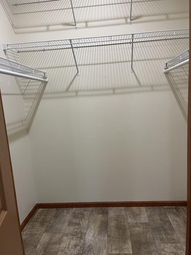 N13403 US Highway 141, Wausaukee, WI 54177 - spacious closet featuring dark wood-style flooring