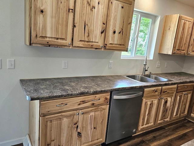 1209 E 15th St, Marshfield, WI 54449 - kitchen featuring dishwasher, dark countertops, dark wood-style flooring, and light brown cabinetry