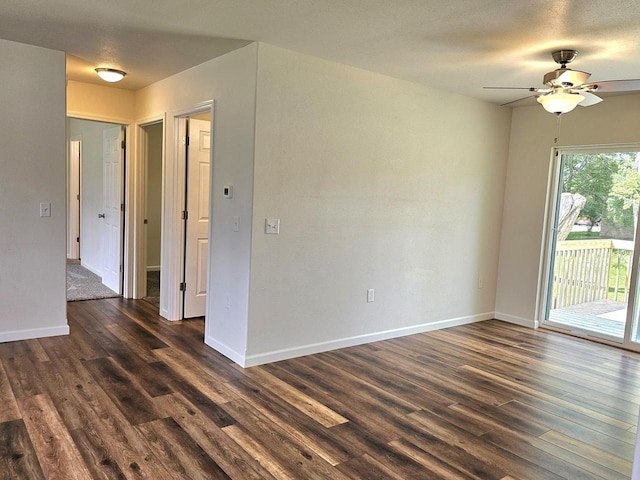 1209 E 15th St, Marshfield, WI 54449 - empty room with dark wood-style floors and ceiling fan