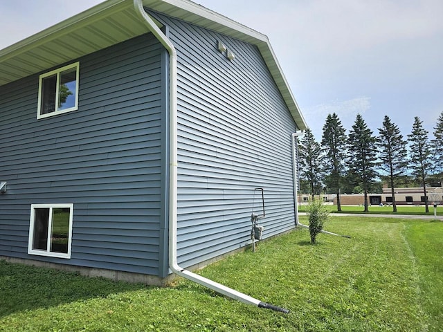1209 E 15th St, Marshfield, WI 54449 - view of property exterior featuring a yard