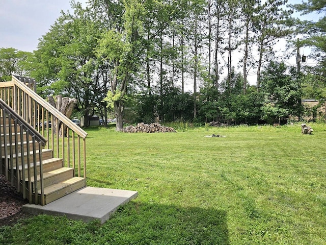 1209 E 15th St, Marshfield, WI 54449 - view of grassy yard featuring stairs