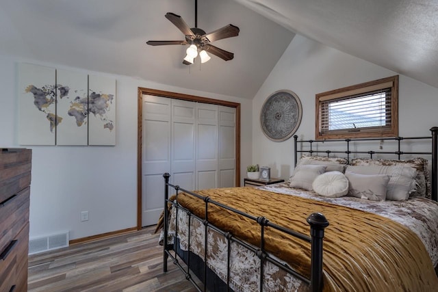 400 Oak St, Argyle, WI 53504 - bedroom featuring wood finished floors, vaulted ceiling, a closet, and a ceiling fan