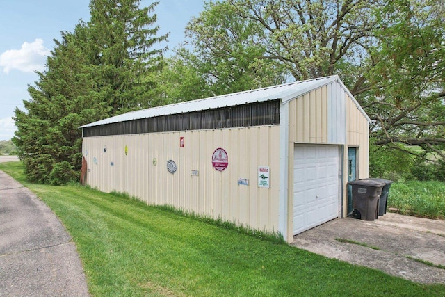 N5562 County Road A, Lake Mills, WI 53551 - detached garage featuring asphalt driveway
