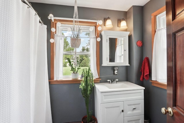 N5562 County Road A, Lake Mills, WI 53551 - full bathroom featuring vanity and a shower with curtain