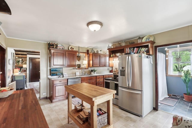 N5562 County Road A, Lake Mills, WI 53551 - kitchen with appliances with stainless steel finishes, open shelves, and light floors