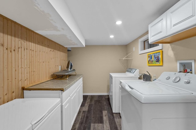 6170 Bay Shore Dr, Sturgeon Bay, WI 54235 - washroom featuring independent washer and dryer, cabinet space, dark wood-style floors, wood walls, and recessed lighting