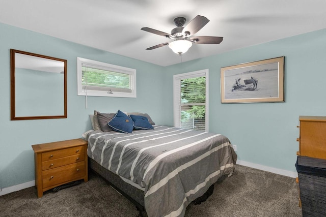 6170 Bay Shore Dr, Sturgeon Bay, WI 54235 - carpeted bedroom with baseboards and ceiling fan