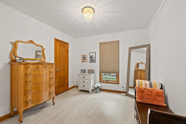 1240 Franklin St, Wisconsin Rapids, WI 54494 - bedroom featuring light wood-style flooring and a chandelier