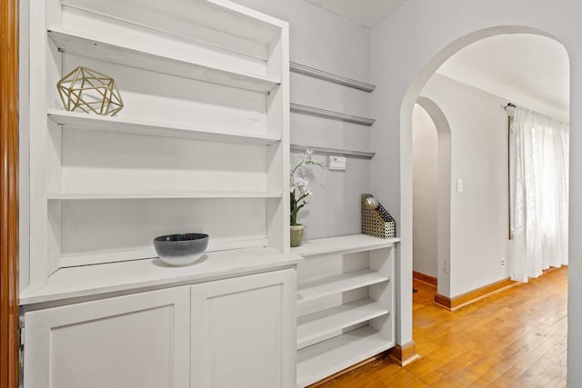 1240 Franklin St, Wisconsin Rapids, WI 54494 - detailed view of arched walkways and wood finished floors