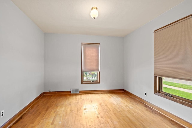 1240 Franklin St, Wisconsin Rapids, WI 54494 - unfurnished room featuring wood-type flooring and baseboards