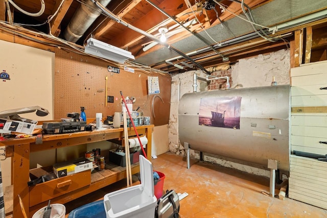 1240 Franklin St, Wisconsin Rapids, WI 54494 - unfinished basement featuring heating fuel and a workshop area