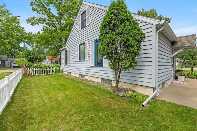 1240 Franklin St, Wisconsin Rapids, WI 54494 - view of side of home featuring a patio