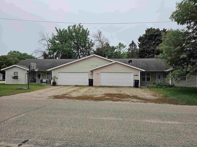 105 W Clark St, Plainfield, WI 54966 - ranch-style home with a garage, driveway, and a front yard