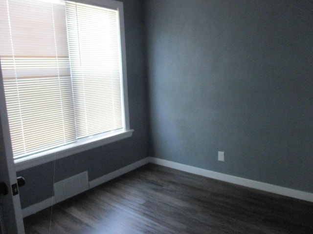 2116 W Atkinson Ave Unit 2116A, Milwaukee, WI 53209 - unfurnished room with dark wood-style floors and baseboards