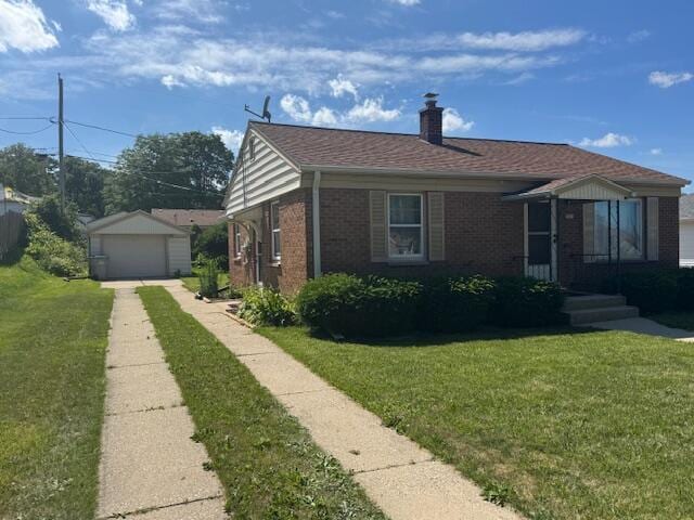3681 S 5th St, Milwaukee, WI 53207 - view of front of property with brick siding, a detached garage, a front lawn, and a chimney